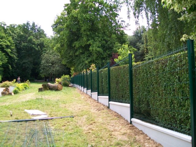 cloture terrain en pente